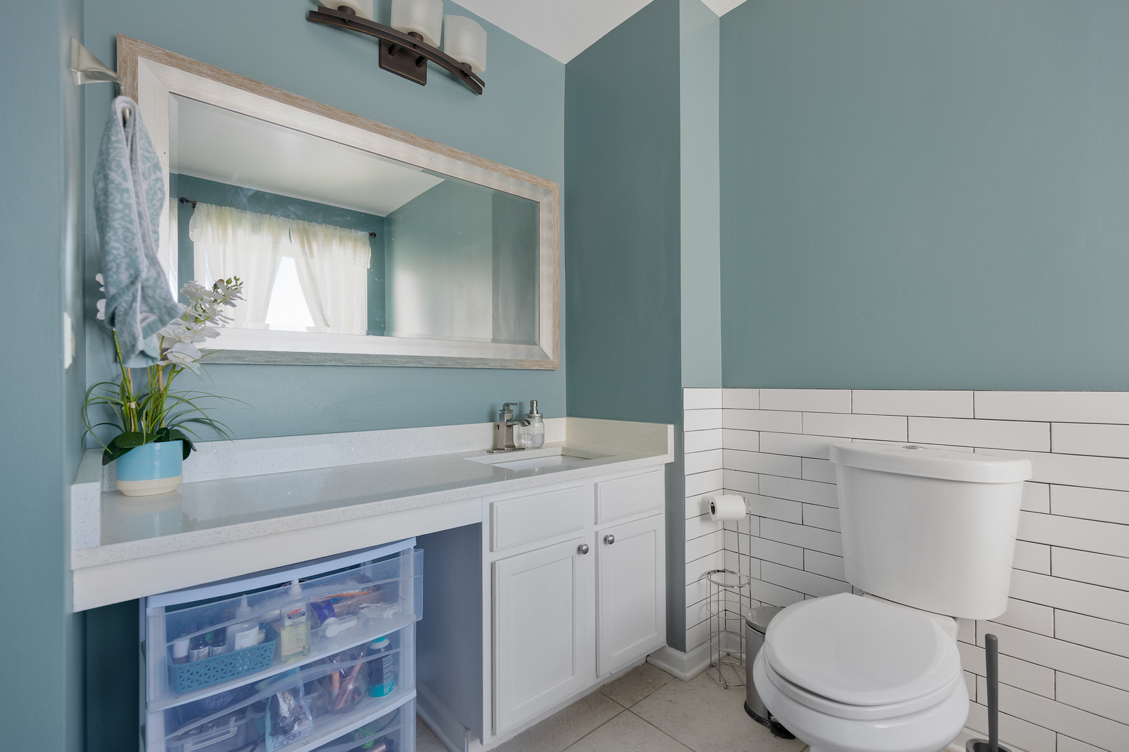 1 Carl Court Lake In The Hills, IL 60156 - Photo 12 of 20 a bathroom with a granite countertop toilet sink and mirror