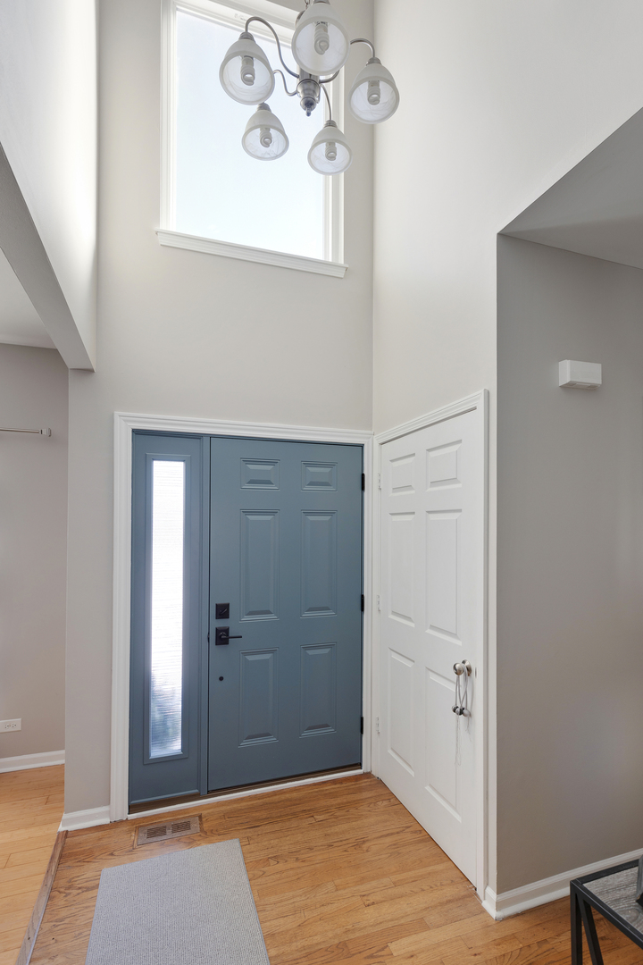 1 Carl Court Lake In The Hills, IL 60156 - Photo 2 of 20 wooden floor in an empty room