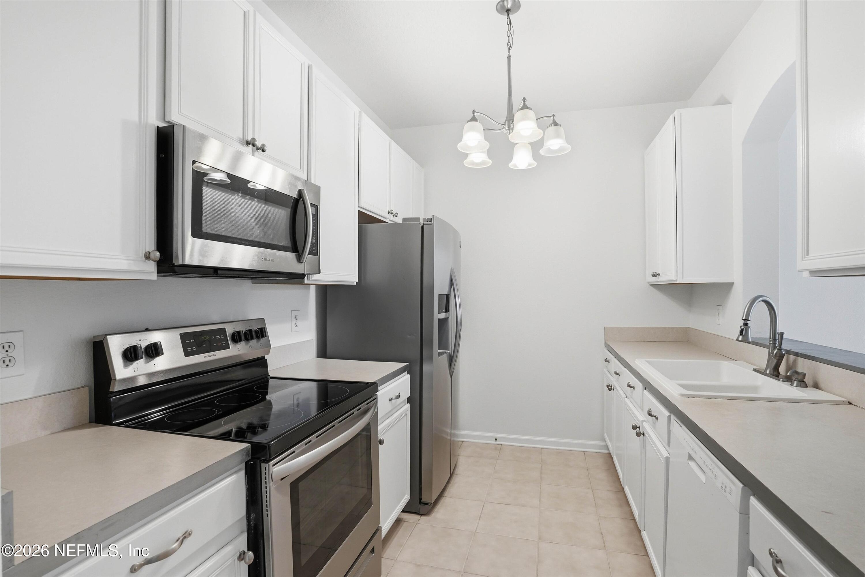 7990 Baymeadows Road East, Unit 918 Jacksonville, FL 32256 - Photo 6 of 37 06-Kitchen