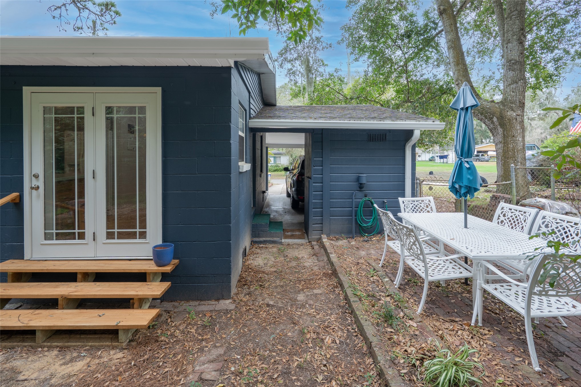 807 Stanley Drive Fernandina Beach, FL 32034 - Photo 29 of 30 a backyard of a house with outdoor seating