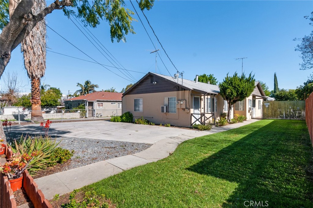 3941 Everest Avenue Riverside, CA 92503 - Photo 1 of 1 a front view of a house with a yard and porch