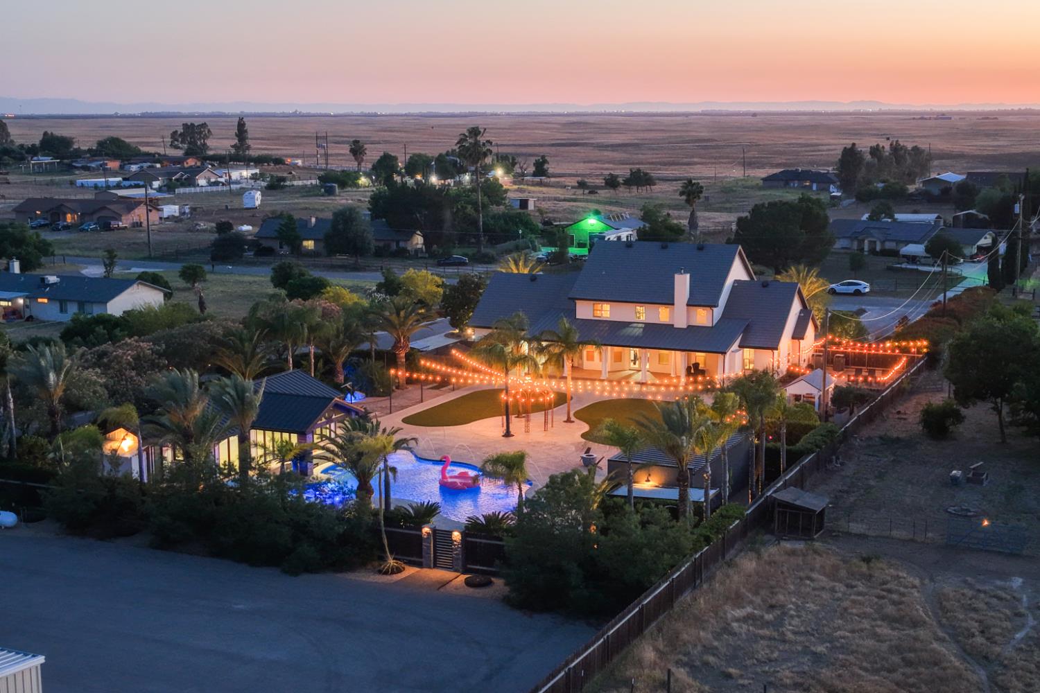 17113 Mark Road Madera, CA 93636 - Photo 95 of 99 an aerial view of a houses with a yard