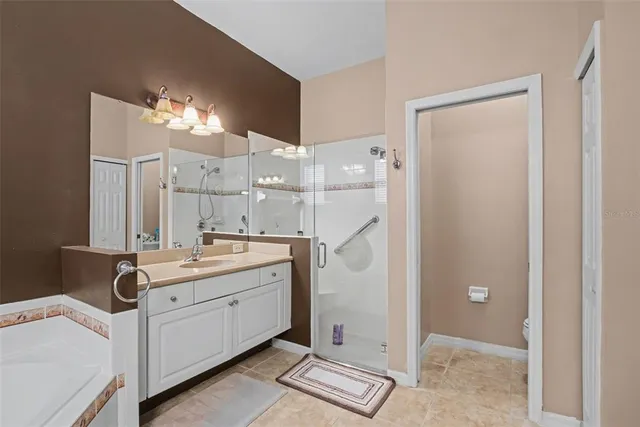 a view of a storage & utility room with cabinets