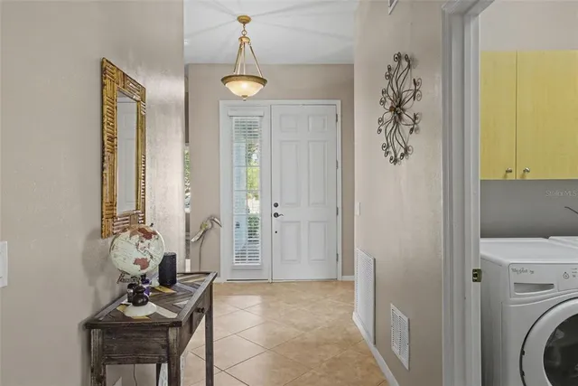a view of room with window and furniture