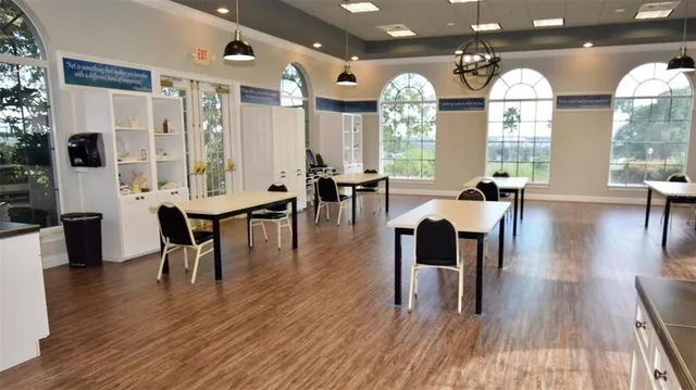 a view of a dining room with furniture