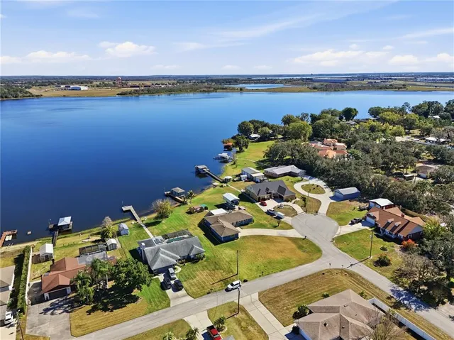a living room with fireplace furniture and a flat screen tv