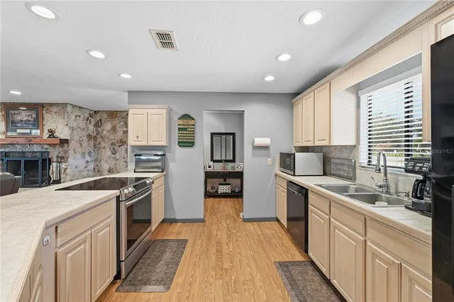a bedroom with a large bed and a large window