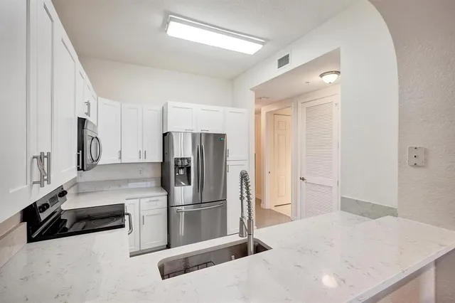 $298,000 | 3600 Oaks Clubhouse Drive, Unit 408, Pompano Beach, FL 33069