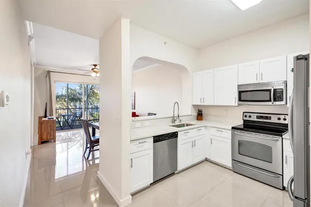 $298,000 | 3600 Oaks Clubhouse Drive, Unit 408, Pompano Beach, FL 33069