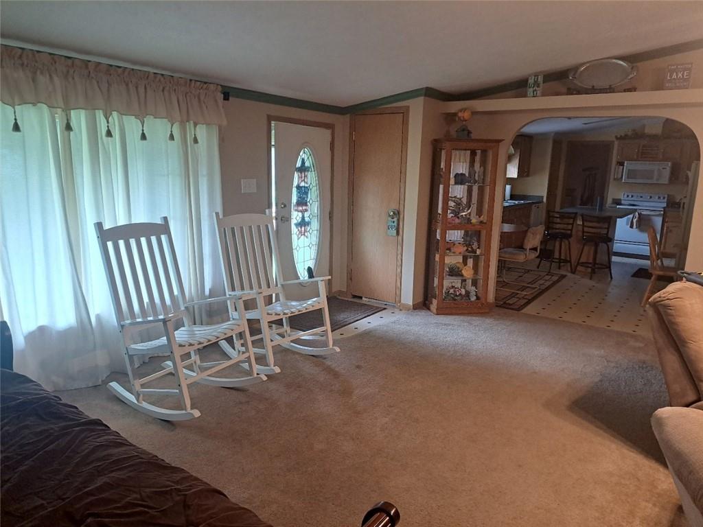 844 Williams Street Confluence, PA 15424 - Photo 5 of 13 a view of a livingroom with furniture and staircase