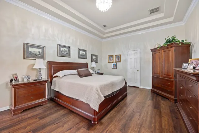 a bathroom with a sink a toilet and shower curtain