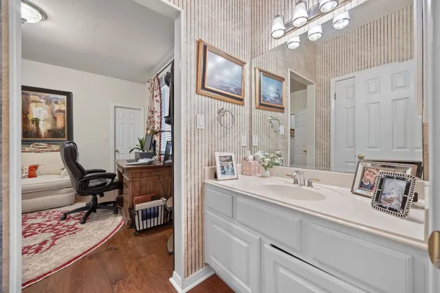 a view of a house with a yard and sitting area