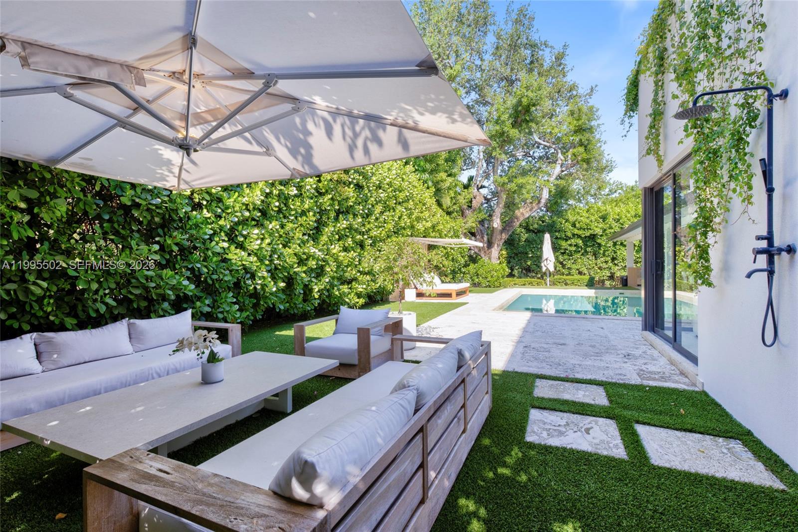 6449 Southwest 56th Street South Miami, FL 33155 - Photo 21 of 39 a view of yard with patio