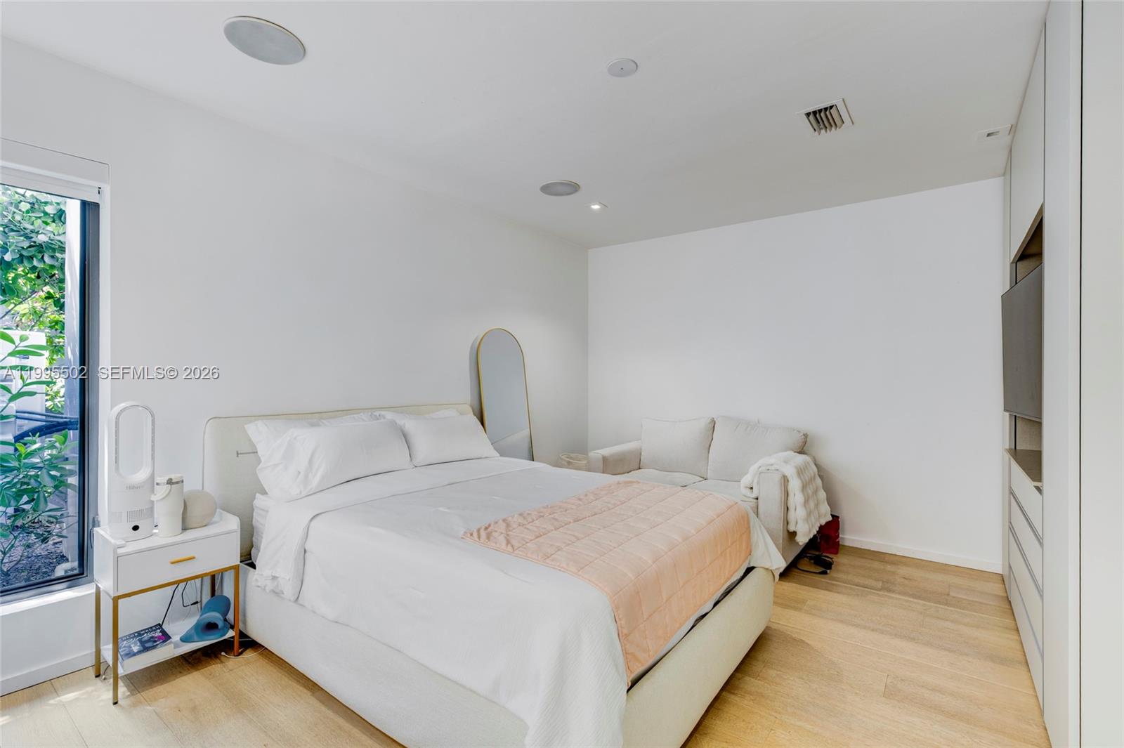 6449 Southwest 56th Street South Miami, FL 33155 - Photo 34 of 39 a bed room with a bed and a chair