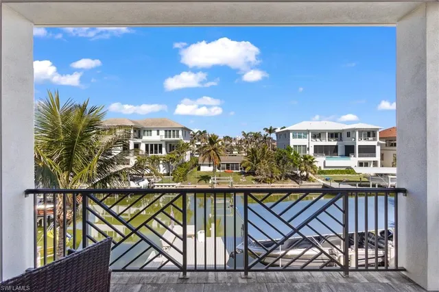 a view of a balcony with an outdoor space