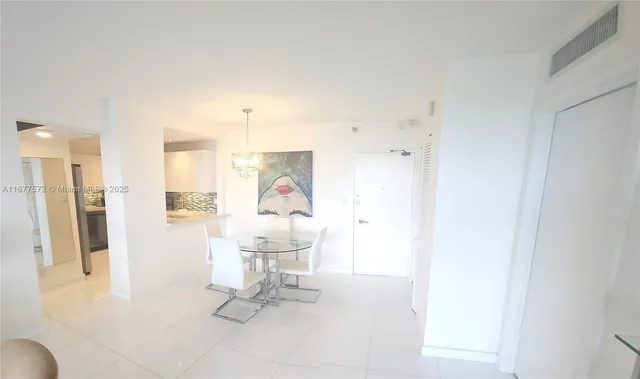 a kitchen with a sink stove and refrigerator