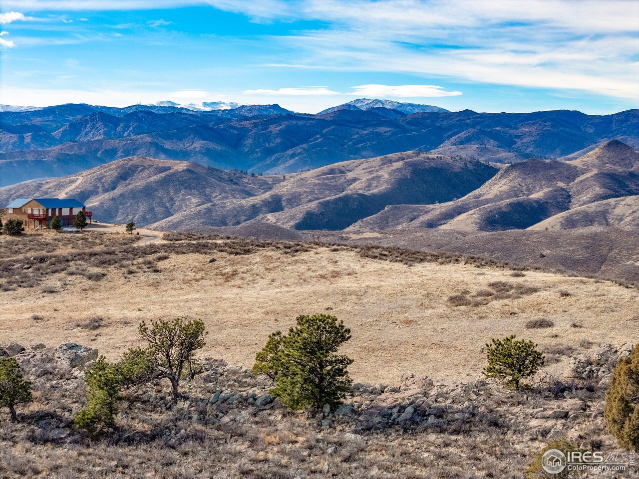 a view of mountain view with mountains in the background