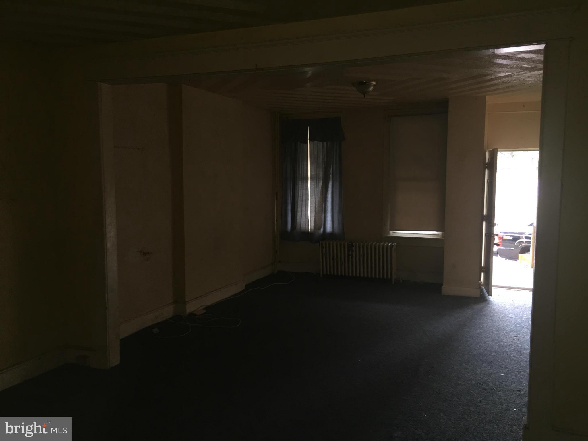 3103 Belair Road Baltimore, MD 21213 - Photo 6 of 11 a view of empty room and window