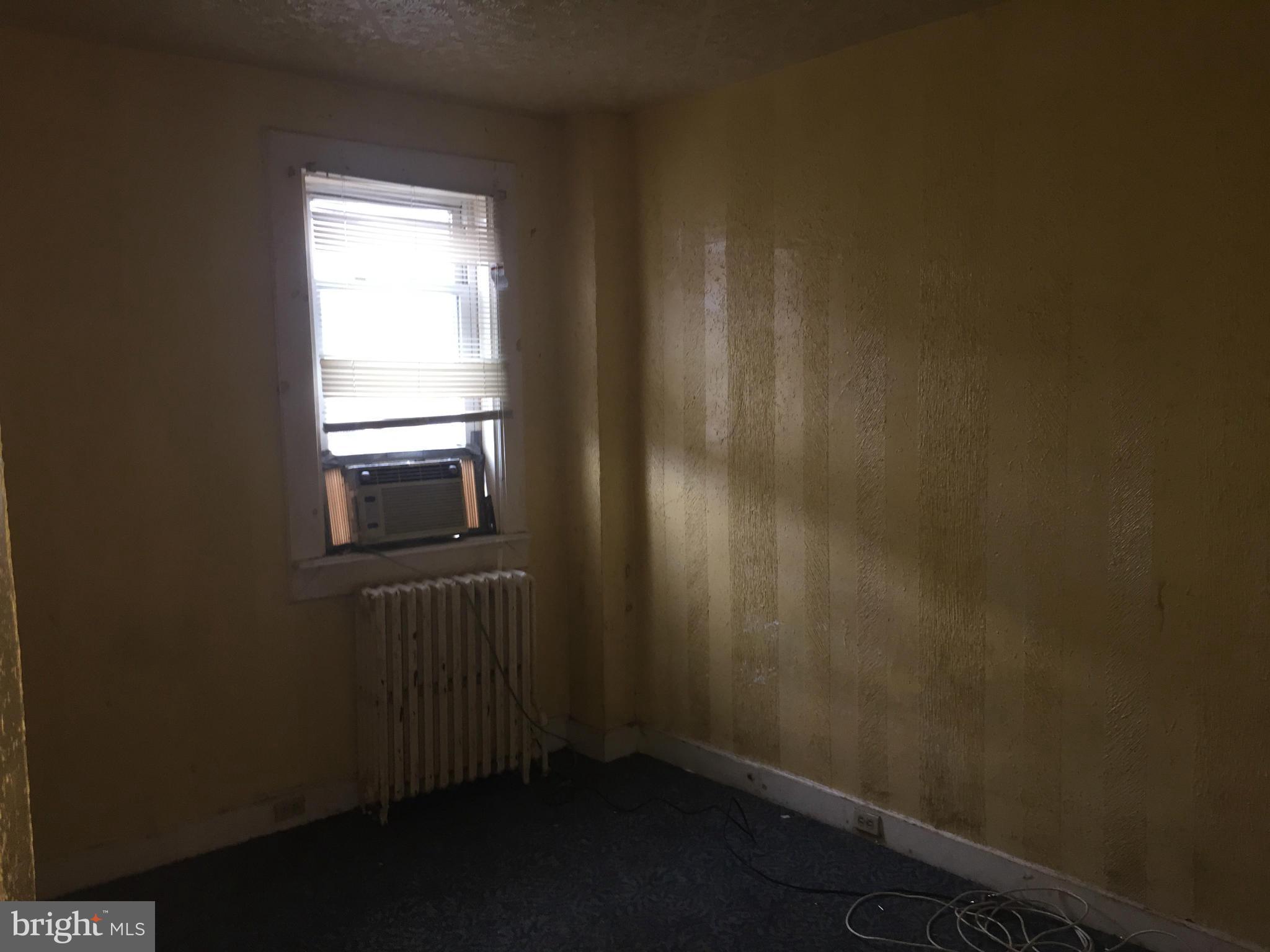 3103 Belair Road Baltimore, MD 21213 - Photo 10 of 11 a small space with a window