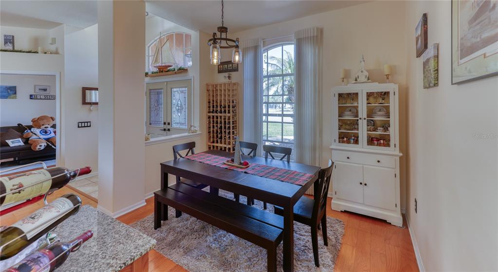 3473 Conifer Loop Spring Hill, FL 34609 - Photo 19 of 33 a view of a workspace with furniture and window