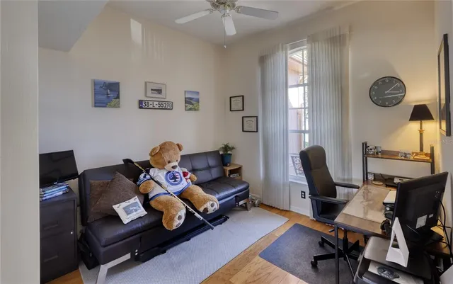 a living room with furniture and a window