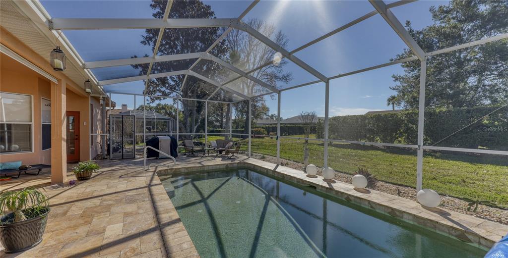 3473 Conifer Loop Spring Hill, FL 34609 - Photo 29 of 33 a view of a house with a backyard