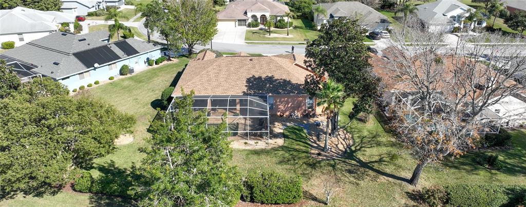 3473 Conifer Loop Spring Hill, FL 34609 - Photo 30 of 33 an aerial view of a house with a yard