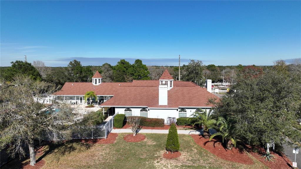3473 Conifer Loop Spring Hill, FL 34609 - Photo 32 of 33 an aerial view of a house