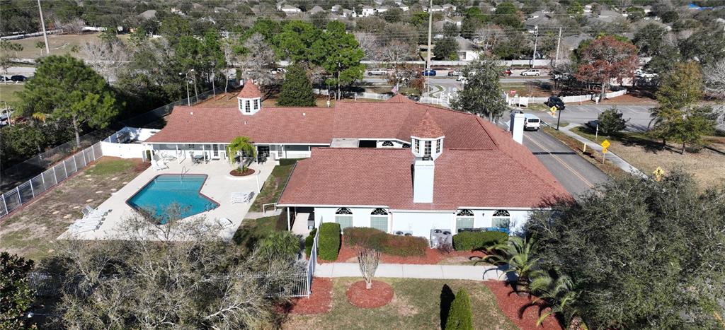3473 Conifer Loop Spring Hill, FL 34609 - Photo 33 of 33 an aerial view of house with yard swimming pool and outdoor seating