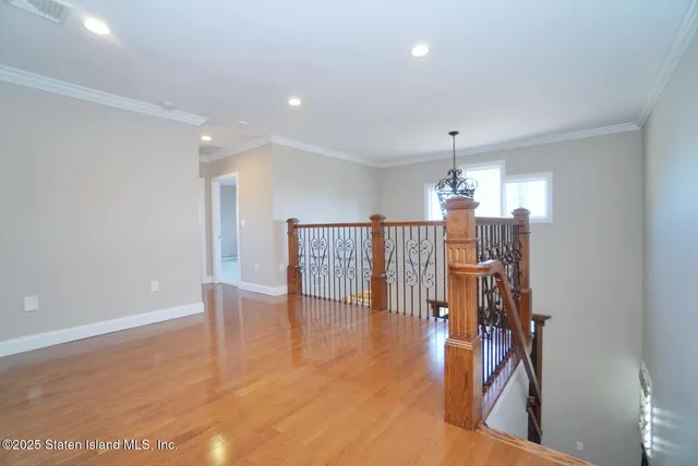 a view of a livingroom with wooden floor