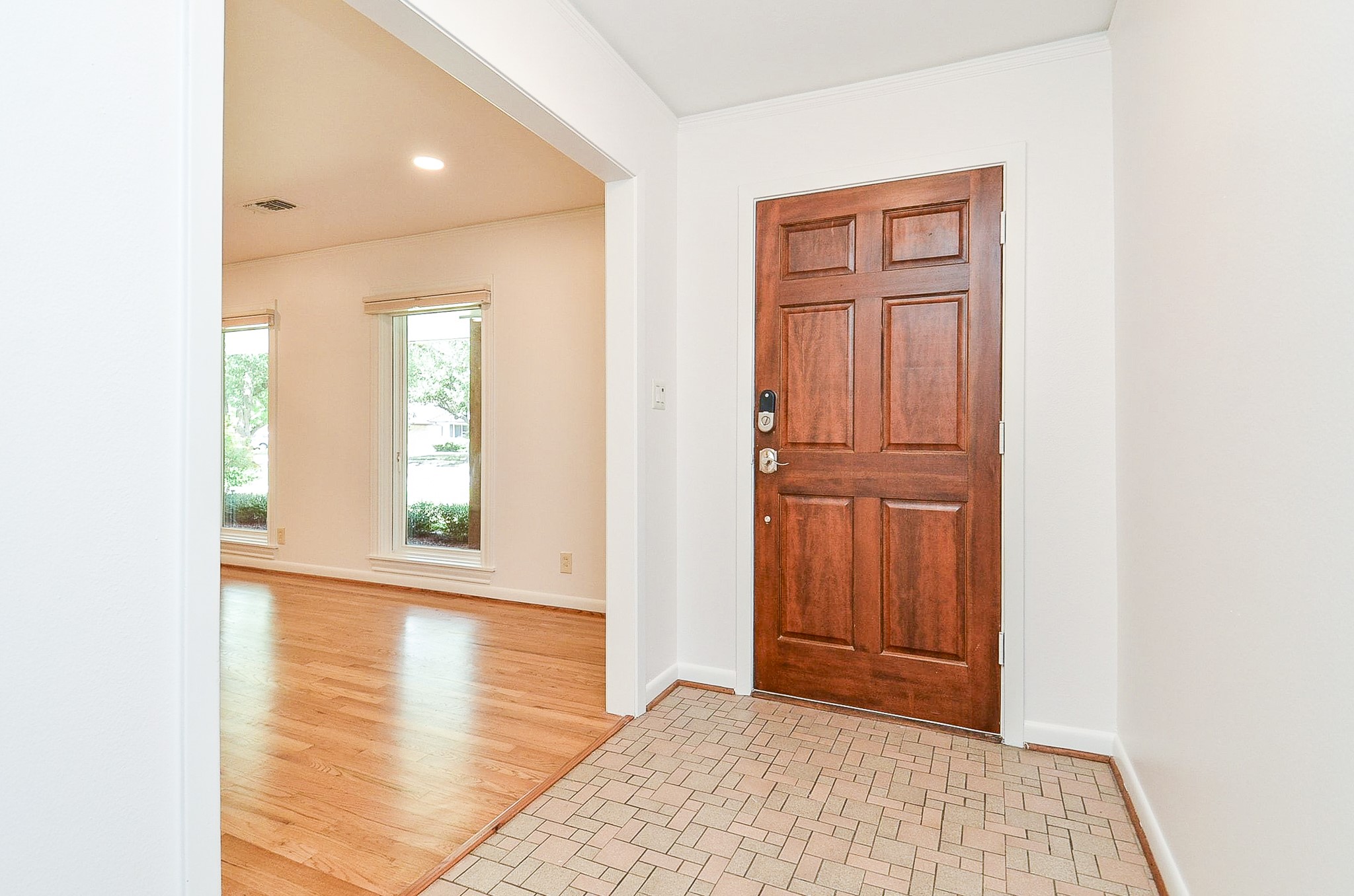 5127 Hummingbird Street Houston, TX 77035 - Photo 3 of 34 Walk in the front door and an expansive living room and dining room are to the right.