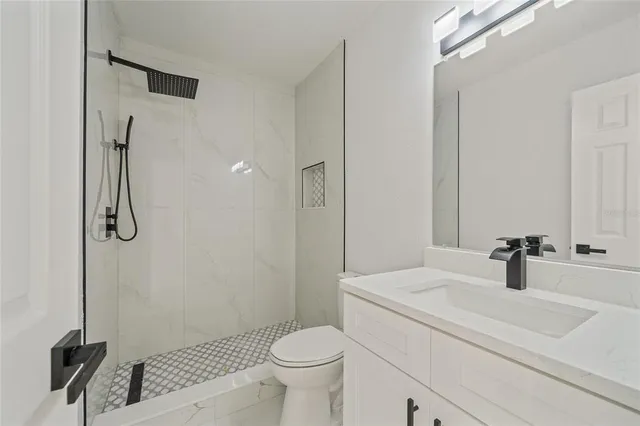 a view of a big room with windows