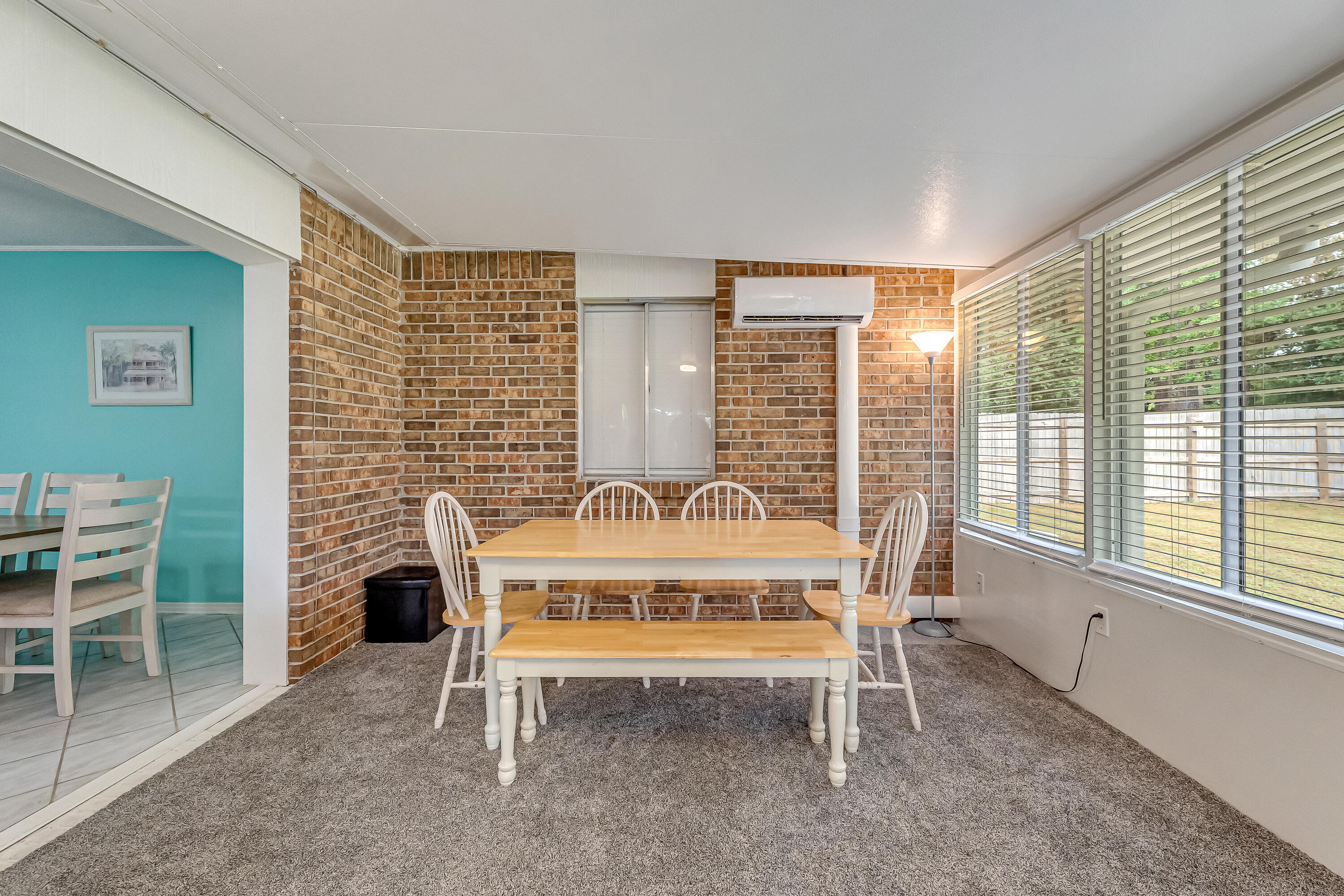 1811 Rattan Palm Drive Niceville, FL 32578 - Photo 24 of 57 a view of a room with a table and chairs