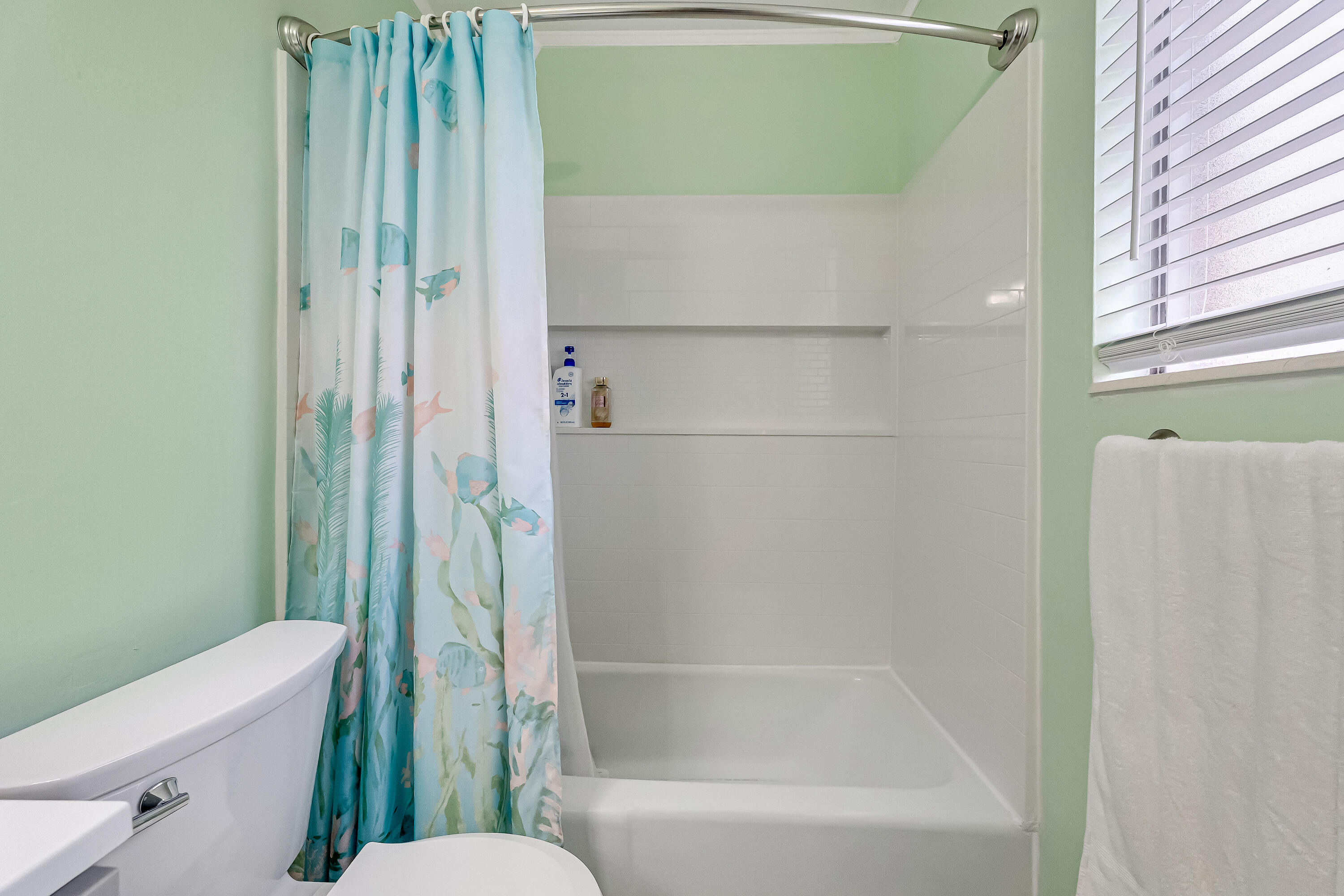 1811 Rattan Palm Drive Niceville, FL 32578 - Photo 34 of 57 a bathroom with a toilet and a bathtub