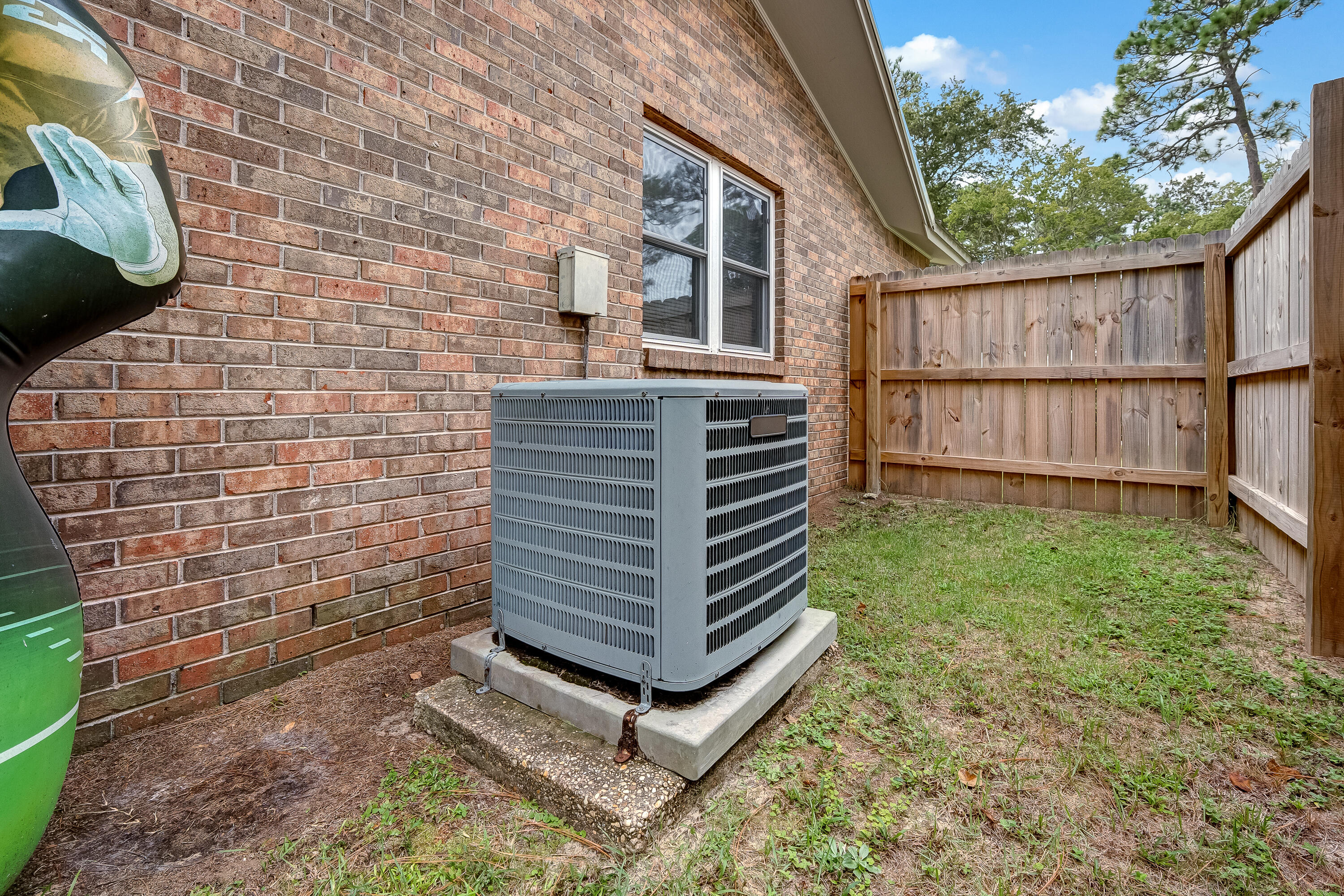 1811 Rattan Palm Drive Niceville, FL 32578 - Photo 52 of 57 a view of wooden house with a yard