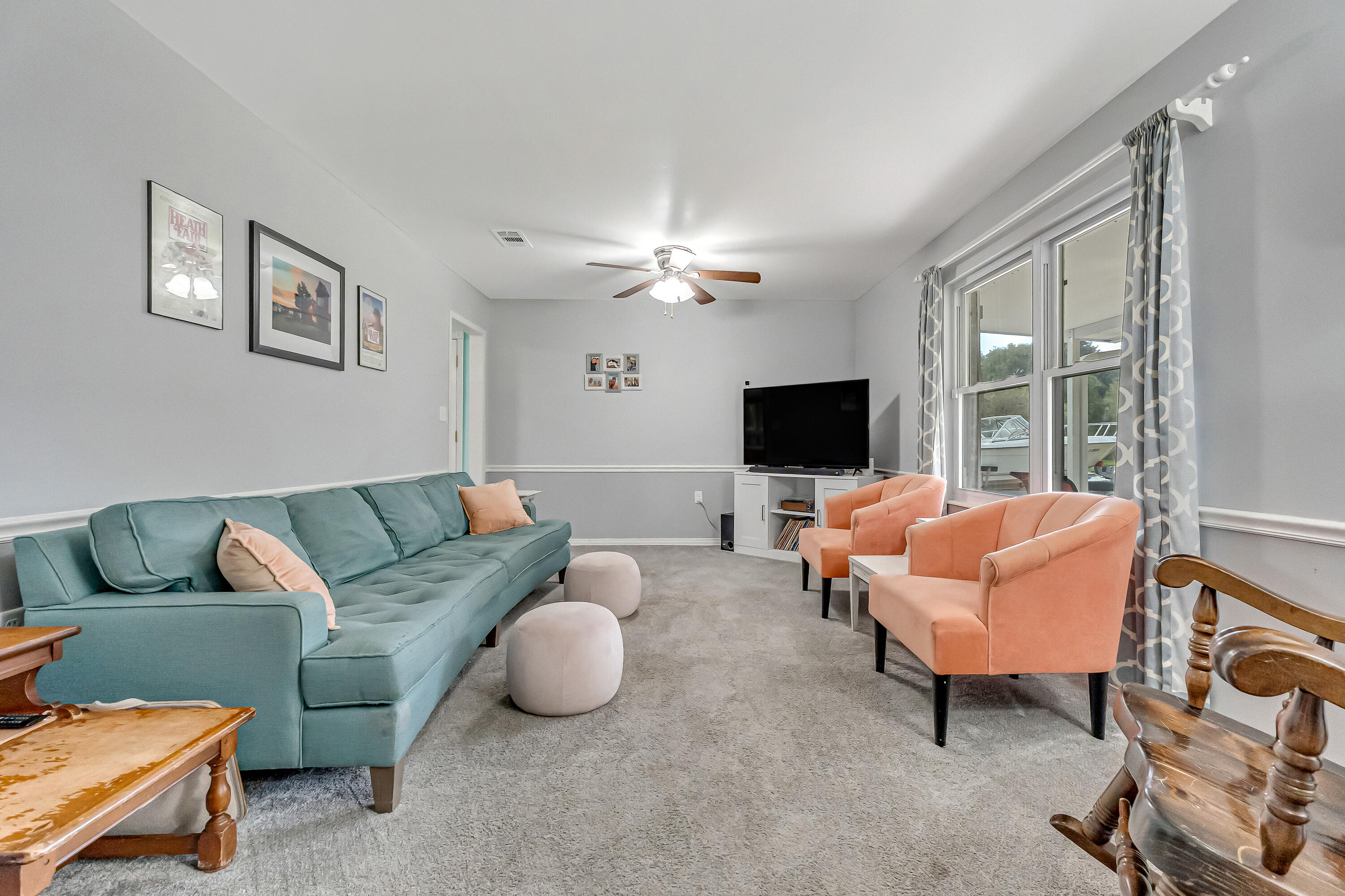 1811 Rattan Palm Drive Niceville, FL 32578 - Photo 7 of 57 a living room with furniture and a flat screen tv