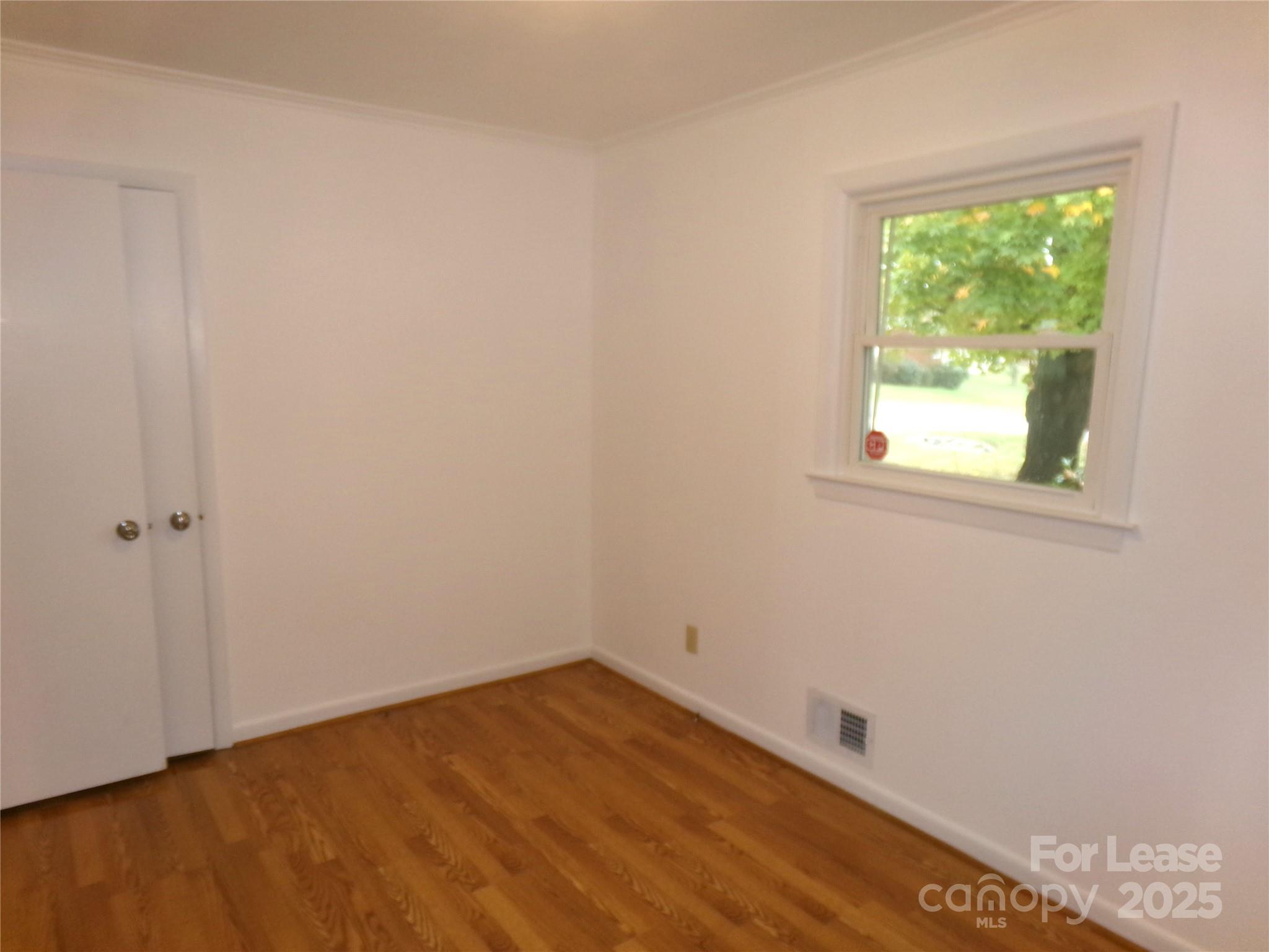 801 Anderson Road Albemarle, NC 28001 - Photo 13 of 23 an empty room with a window