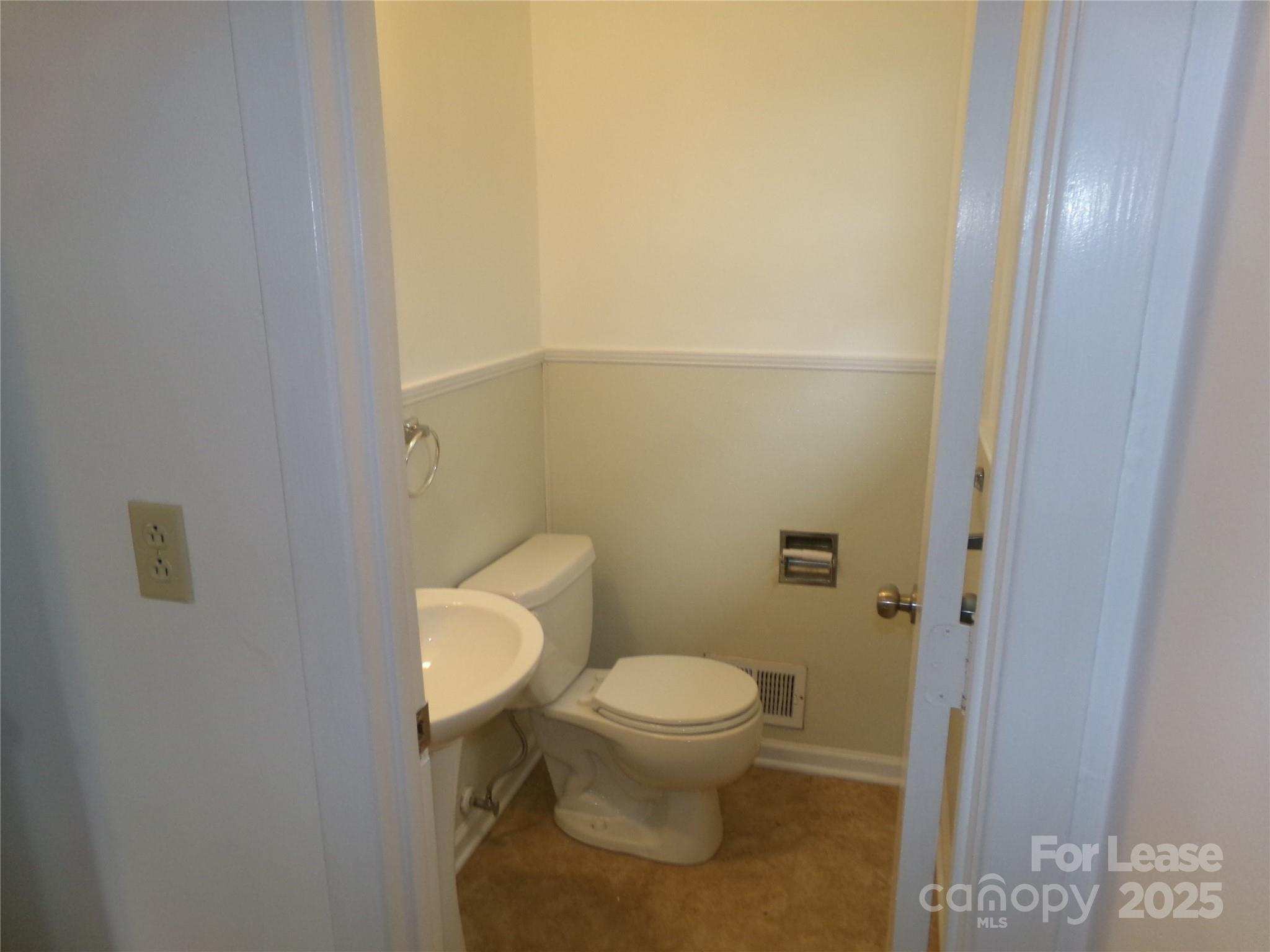 801 Anderson Road Albemarle, NC 28001 - Photo 20 of 23 a bathroom with a toilet and a shower