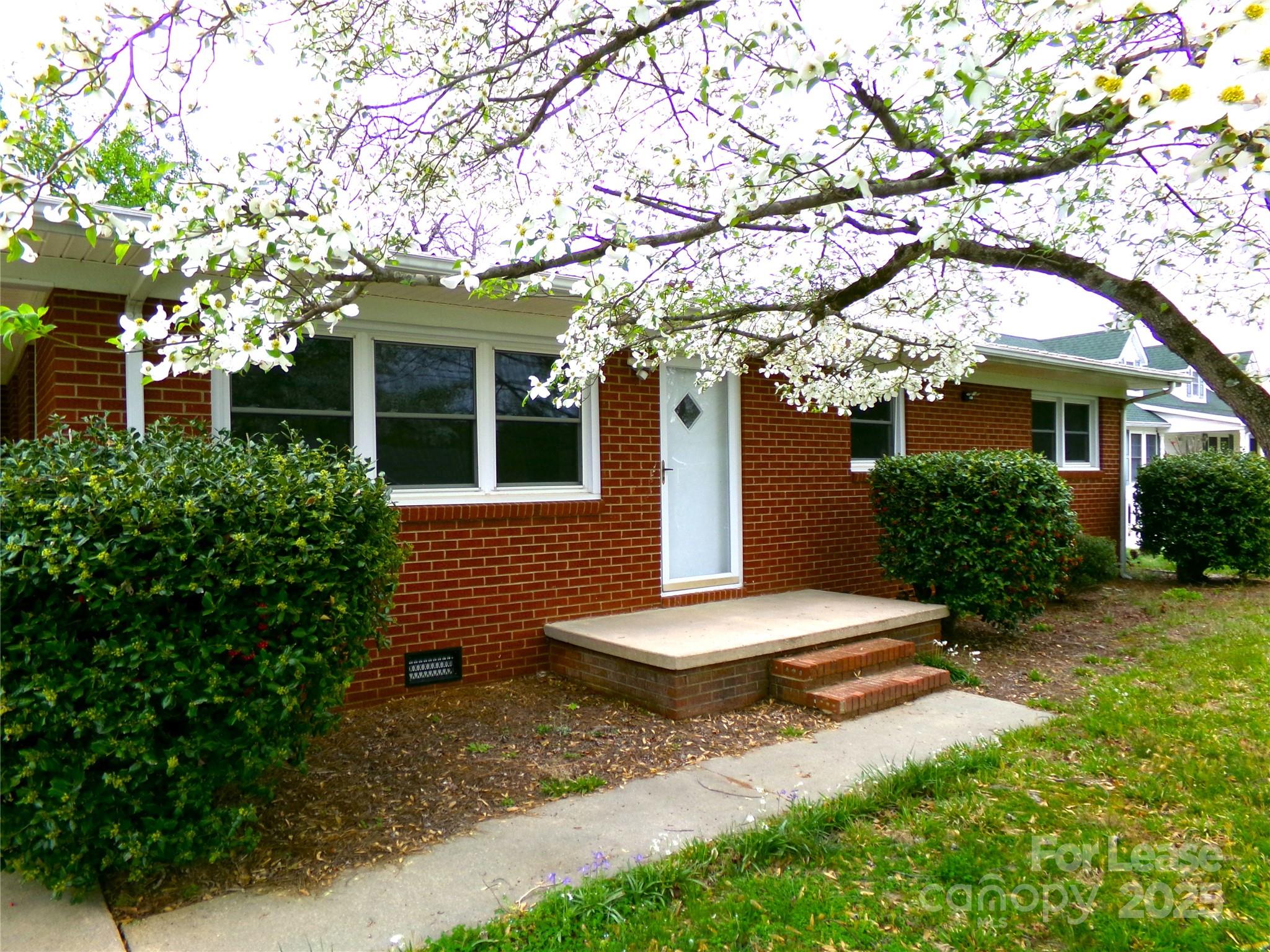 801 Anderson Road Albemarle, NC 28001 - Photo 2 of 23 front view of a house with a tree