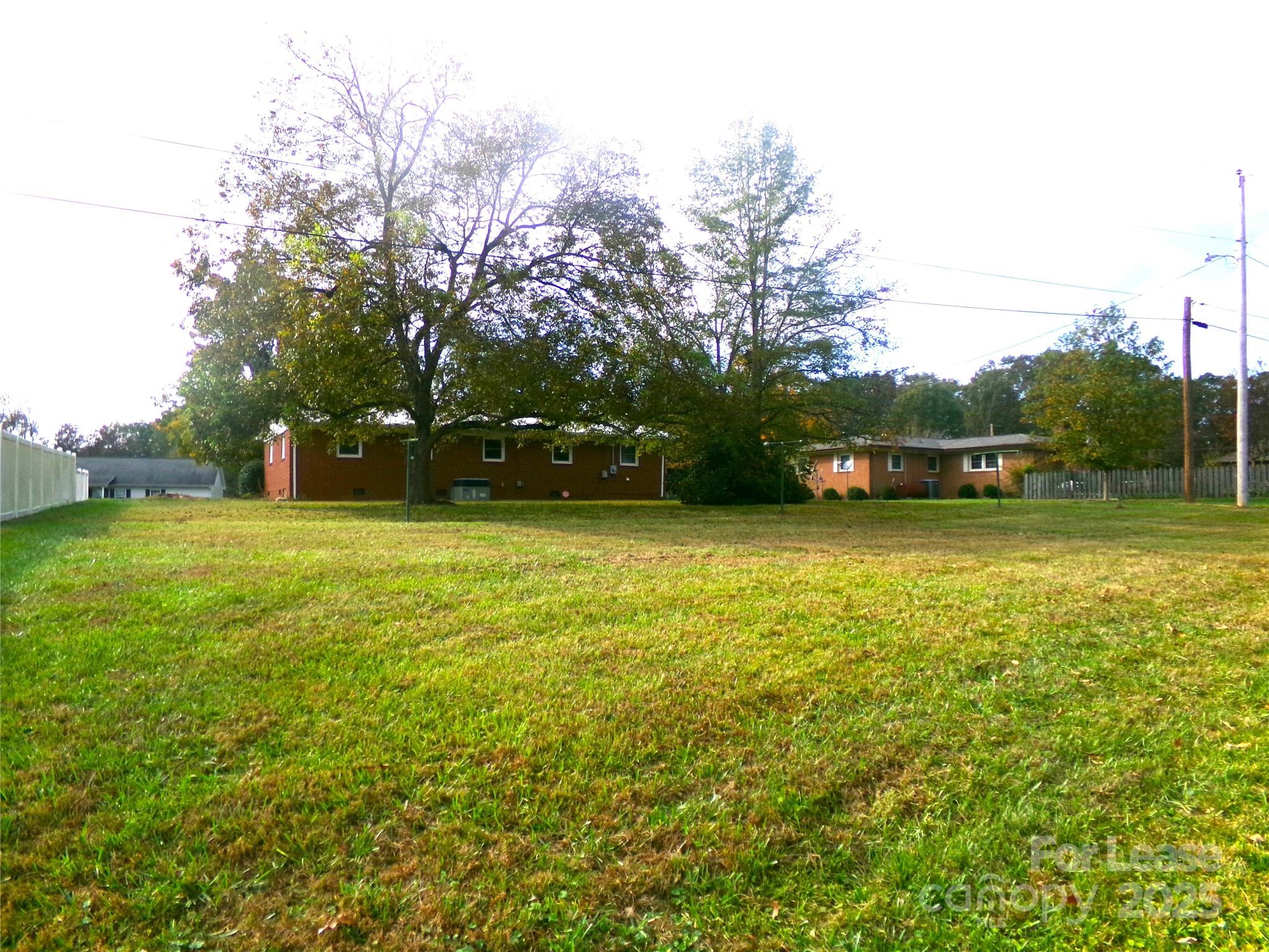 801 Anderson Road Albemarle, NC 28001 - Photo 22 of 23 a view of yard with swimming pool and green space