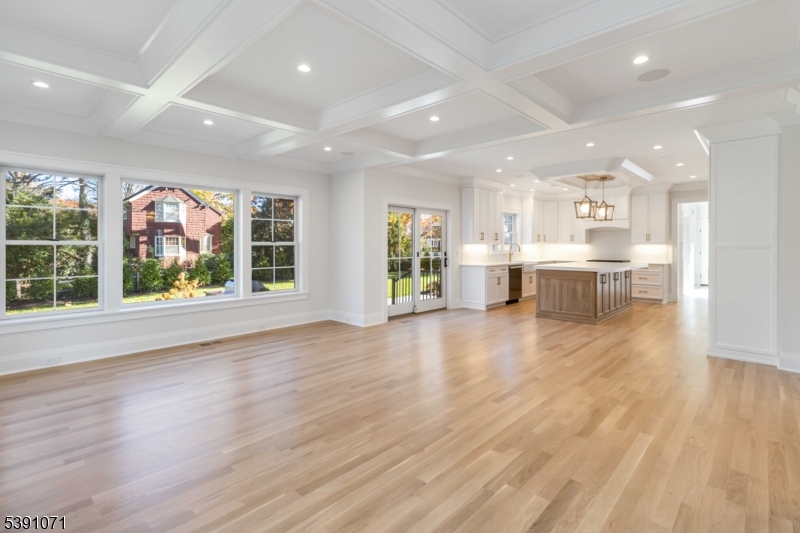 2 Whitman Drive Chatham, NJ 07928 - Photo 12 of 50 an open kitchen view with wooden floor and windows