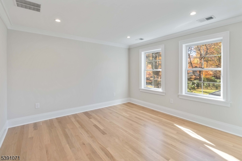 2 Whitman Drive Chatham, NJ 07928 - Photo 35 of 50 a view of an empty room with a window