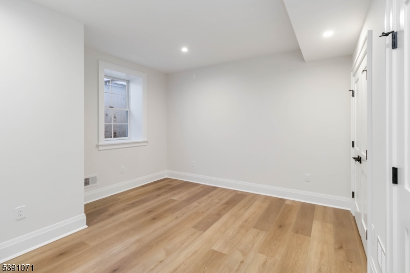 2 Whitman Drive Chatham, NJ 07928 - Photo 44 of 50 wooden floor in an empty room