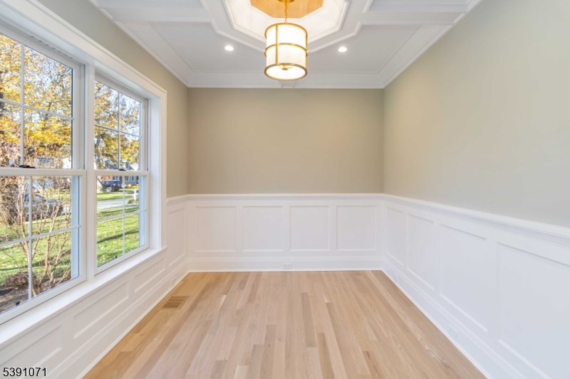 2 Whitman Drive Chatham, NJ 07928 - Photo 7 of 50 a view of a room with wooden floor and window