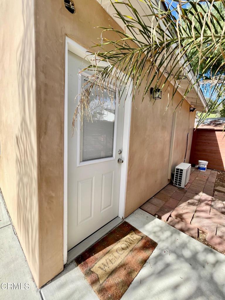 211 Fox Street Ojai, CA 93023 - Photo 19 of 33 a bed sitting in a bedroom next to a window