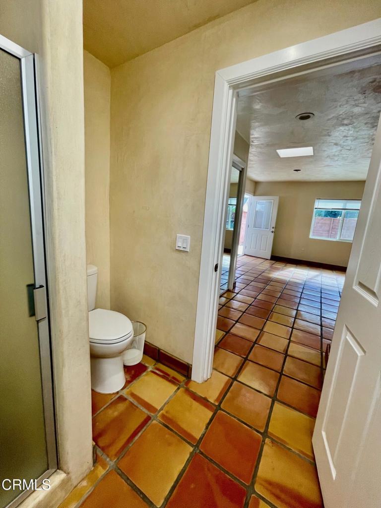 211 Fox Street Ojai, CA 93023 - Photo 26 of 33 a bathroom with a toilet and a shower
