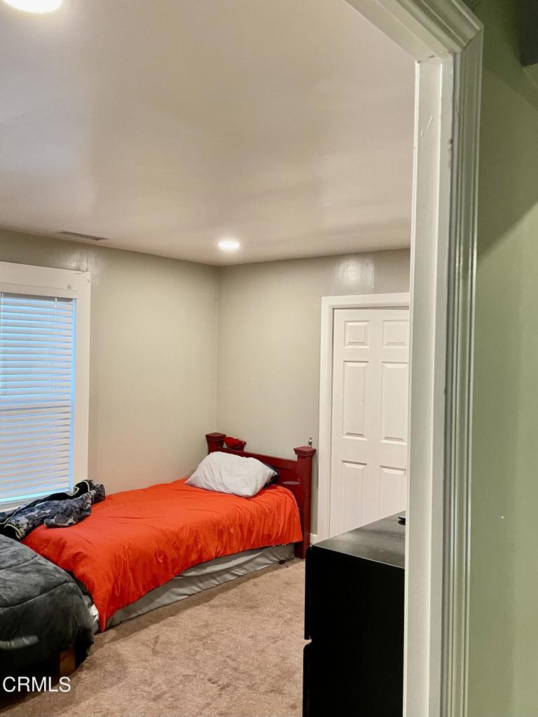 211 Fox Street Ojai, CA 93023 - Photo 9 of 33 a bedroom with a bed and a closet