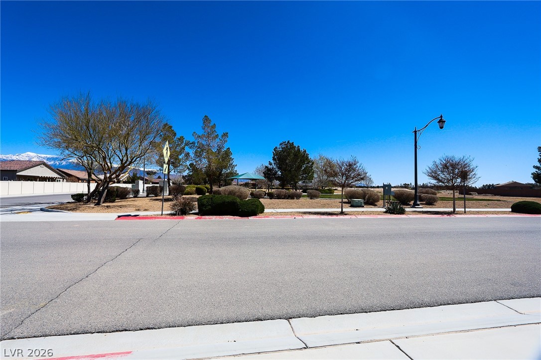 6472 Centennial Road Pahrump, NV 89048 - Photo 20 of 29 A well-maintained neighborhood park features mature landscaping and distant mountain views.