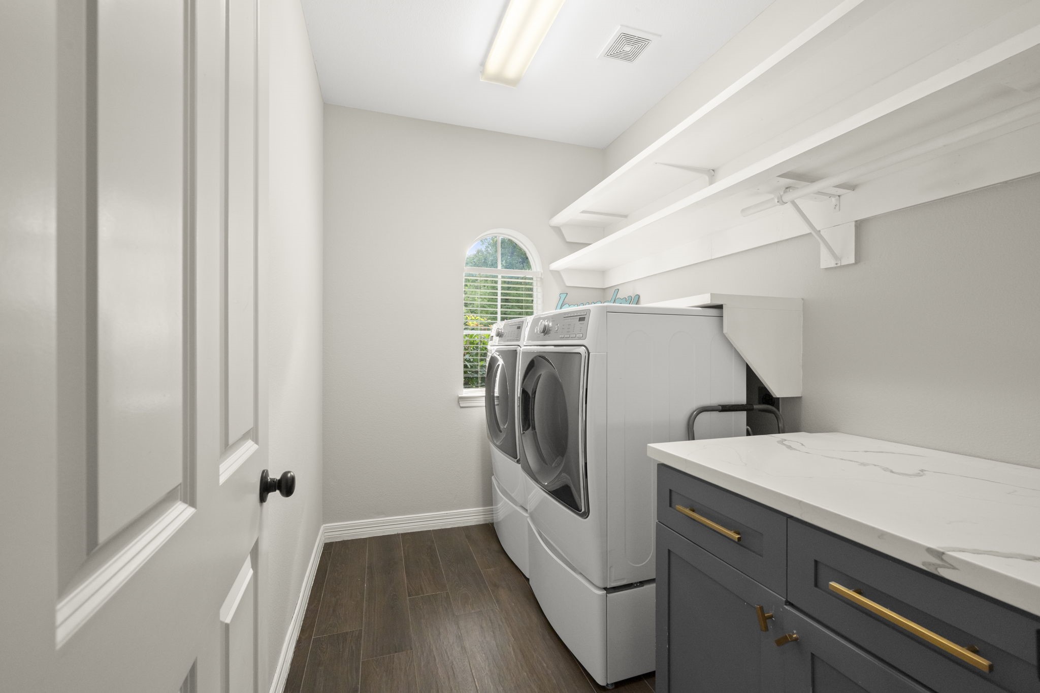 2326 Timbergreen Circle Magnolia, TX 77355 - Photo 35 of 43 a view of a storage & utility room with washer and dryer