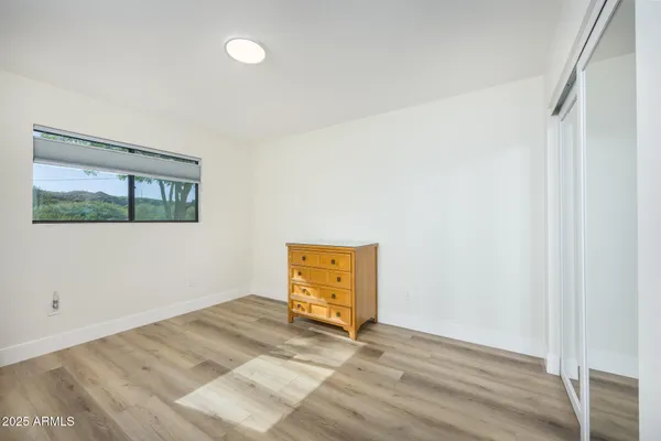 a room with lots of different colored cloths